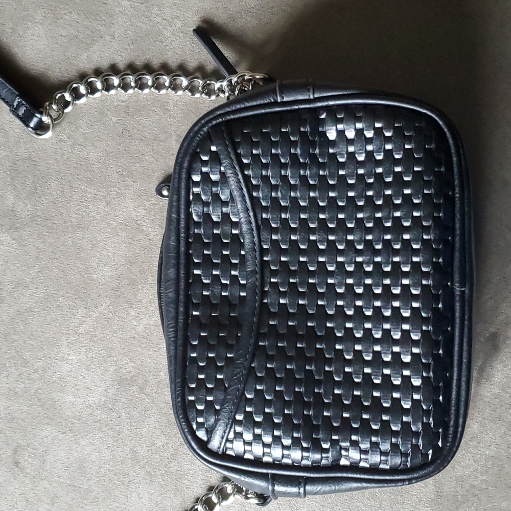 B.O.C black woven cross body.